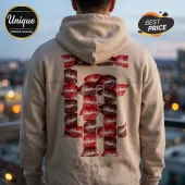 Tan hoodie with back graphic of red lipstick kiss marks forming the letters LA in a bold block style font!
