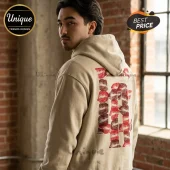 Tan hoodie with large red and brown lipstick kiss mark print on back in block letter arrangement!