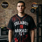 Black baseball jersey with white ESLABON ARMADO text, red spider webs, and guitar graphics on brick background!