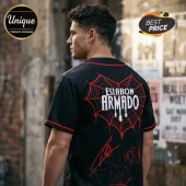 Black baseball jersey with red spider web graphic and white Eslabon Armado text on the back!