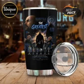 Black tumbler with Pep Guardiola tribute graphic, Manchester City logo, trophy count, and blue text on wooden surface!