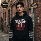 Black hoodie with white My Chemical Romance text red MCR logo and skull arm patches on a male model!