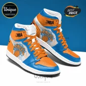 High-top sneaker in orange and blue with New York Knicks logo and NBA branding on a white background!