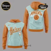 New York Knicks hoodie in light blue and orange with basketball graphics and logo text print!