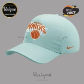 Light blue New York Knicks baseball cap with orange text and basketball logo graphic!