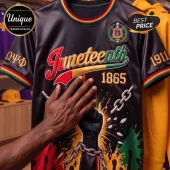 Black Juneteenth t-shirt with red, gold, green accents, Omega Psi Phi crest, 1865 text, and broken chain fist graphic!