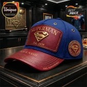Blue and red Superman cap with leather patch featuring gold S logo Est 1938 text and personalized name brim embroidery!