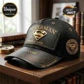 Black leather baseball cap with gold Superman logo text Est 1938 and Man Of Steel patch on side!