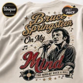 Bruce Springsteen t-shirt design with vintage typography, microphone, vinyl record icon, and star accents on beige cotton.!