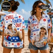 White short-sleeve button-down shirt featuring red and blue stars, flowers, and text Chill The Fourth Out at the beach.!