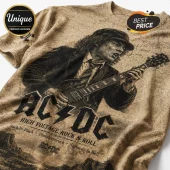 AC/DC tan t-shirt featuring Angus Young playing guitar with band logo and song titles in black ink-style print.!