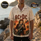AC/DC short-sleeve button-down shirt featuring Angus Young playing guitar with a sunset beach and seashell pattern background.!