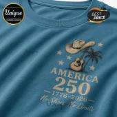 Blue cotton t-shirt featuring a western graphic with a cowboy hat, acoustic guitar, palm tree, stars, and America 250.!