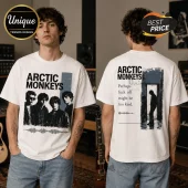 Arctic Monkeys graphic t-shirt featuring band members on the front and lyrics on the back in black ink on white cotton.!