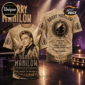 Barry Manilow graphic t-shirt with portrait, piano illustration, and song titles in sepia tones on a stage background.!