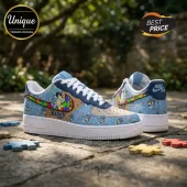 Custom Nike Air Force 1 sneakers featuring blue leather, Bluey character graphics, and colorful puzzle piece swoosh logos.!