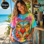 Woman wearing a pastel tie-dye t-shirt with a Bon Jovi logo, winged heart, dagger, and hibiscus flowers, beach background.!