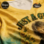 Yellow Bon Jovi V-neck t-shirt featuring sunflower graphics and Just A Girl text with green lettering on fabric.!