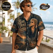 Man wearing a navy short-sleeve button-up shirt featuring a Bon Jovi portrait, guitar, and beach-themed vintage typography.!