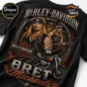Black t-shirt featuring Bret Michaels, a Harley-Davidson logo, eagle, motorcycle, and fire graphics in orange and grey tones.!