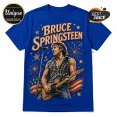 Bruce Springsteen graphic t-shirt in royal blue with vintage concert illustration, electric guitar, and American flag motif.!