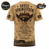 Bruce Springsteen tan graphic t-shirt featuring a heart, electric guitar, song titles, and concert crowd scene design.!