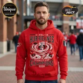 Man wearing red Carolina Hurricanes Stanley Cup 2026 champions hoodie with hurricane swirl graphic and trophy illustration.!