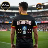 Back view of a man wearing a black Super Rugby Pacific Champions 2026 Chiefs jersey in a stadium.!