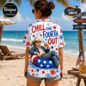 White short-sleeve button-down shirt featuring a cowboy in an American flag inner tube with text Chill The Fourth Out.!