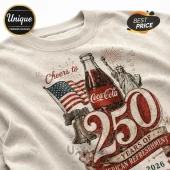 Cream-colored sweatshirt featuring vintage American graphic, Coca-Cola bottle, Statue of Liberty, and Liberty Bell.!