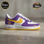 Custom purple and gold leather sneaker with Los Angeles basketball emblem, white laces, and personalized name script.!
