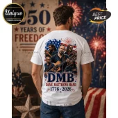 White t-shirt featuring a Dave Matthews Band graphic with members, red, white, and blue patriotic stars and fireworks.!