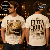 Off-white cotton t-shirt featuring Elton John playing piano on the front and oversized lettering with sunglasses on back.!