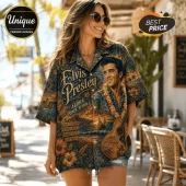 Woman wearing blue button-down shirt featuring Elvis Presley portrait, guitar, hibiscus flowers, and Hawaiian beach scenery.!