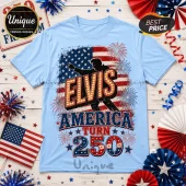 Light blue t-shirt with Elvis silhouette, American flag, fireworks, and text reading Elvis America Turn 250.!