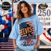 Light blue cotton t-shirt with American flag, Elvis Presley silhouette, firework graphics, and Elvis America Turn 250 text.!
