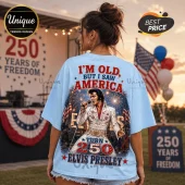 Light blue t-shirt with Elvis Presley graphic, text I'M OLD BUT I SAW AMERICA and TURN 250 ELVIS PRESLEY on back.!