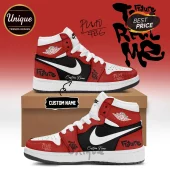 Customized red, white, and black high-top sneakers with graffiti-style 'Future' and 'The Real Me' text on a cardboard box.!