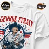 White t-shirt featuring a George Strait illustration, red text, and blue and red patriotic star graphics.!