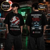 Black cotton t-shirt featuring Ghostbusters movie graphics including the Ecto-1 car, proton ghosts, and iconic film quotes.!