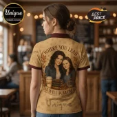 Tan polo shirt with Gilmore Girls artwork showing two women, a coffee cup, books, and text Where You Lead I Will Follow.!