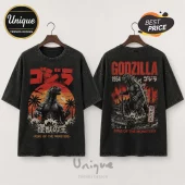 Black acid-wash cotton t-shirt with Godzilla 1954 graphic, red sunset, palm trees, and Japanese text on front and back.!