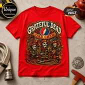 Red cotton t-shirt featuring Grateful Dead Fire Crew graphic with skeletons in firefighter gear holding roses and guitars.!