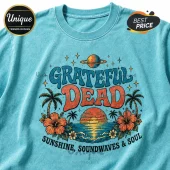 Vintage teal wash t-shirt featuring Grateful Dead graphic with palm trees, hibiscus flowers, sunset, and Saturn planet.!