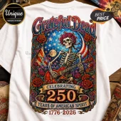 Grateful Dead graphic white t-shirt featuring a skeleton playing a red electric guitar amidst roses and American stars.!