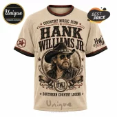Hank Williams Jr. graphic t-shirt in beige featuring a portrait, stars, rope frame, and country music icon text print.!