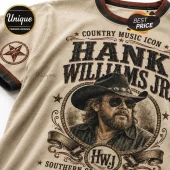 Hank Williams Jr. graphic t-shirt in beige cotton featuring a vintage-style cowboy portrait, western typography, and stars.!