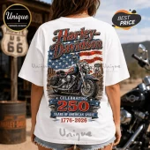 White graphic t-shirt featuring a Harley-Davidson motorcycle, US flag, Route 66 sign, and 1776-2026 anniversary text.!