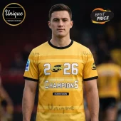 Man wearing yellow Hurricanes rugby jersey with 2026 Super Rugby Pacific Champions text and black trim sleeves.!