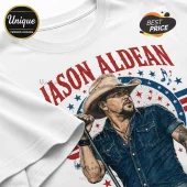 White cotton t-shirt featuring a stylized illustration of Jason Aldean in a cowboy hat against red, white, and blue stars.!